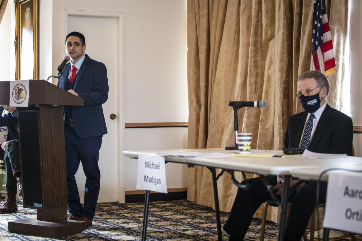 Illinois’ former Speaker of the House Mike Madigan listens as Edward Guerra Kodatt speaks during a committee hearing Sunday on the Southwest Side to decide who will take over as state representative in the 22nd House District seat, a position held by Madigan since 1971.